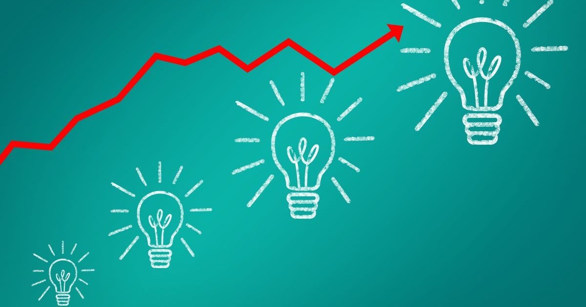 red arrow trending upwards with lightbulbs growth drawing